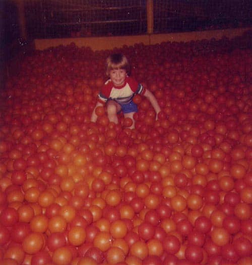 kid in a ball pit